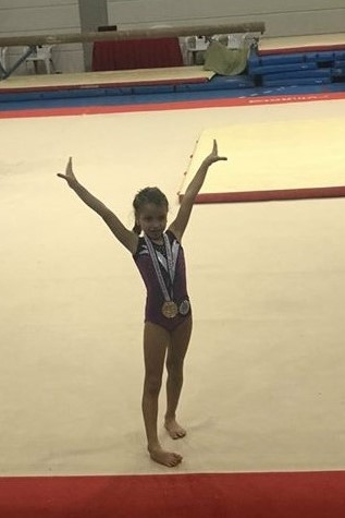 ISK | American Division Congratulates Judy Mohammad (Grade 2A ) for winning a gold medal in Junior Gymnastics