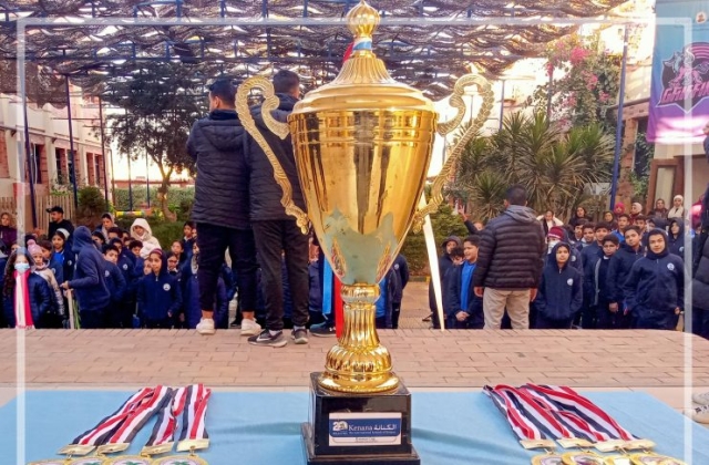 I.S.K American Division Students receiving the cup for football tournament!