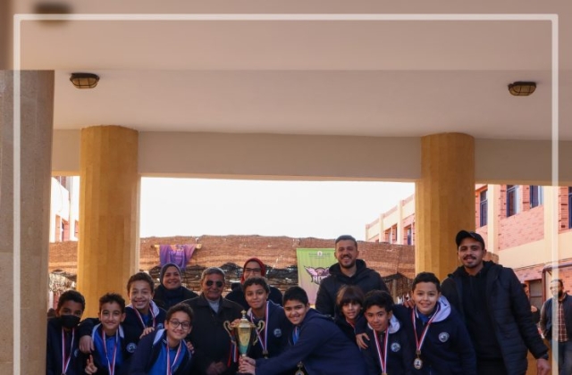 I.S.K American Division Students receiving the cup for football tournament!