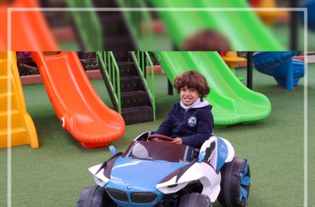 I.S.K | American Division | "Students having fun riding the cars" KG 1B | 2022-2023