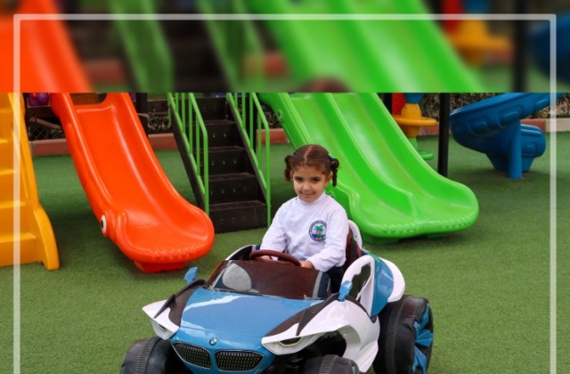 I.S.K | American Division | "Students having fun riding the cars" KG 1B | 2022-2023