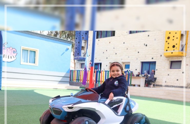 I.S.K | American Division | Students having fun riding the cars KG 2 | 2022-2023