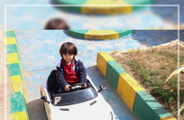 I.S.K | American Division | "Students having fun riding the cars" KG 1A | 2022-2023 | 2022-2023