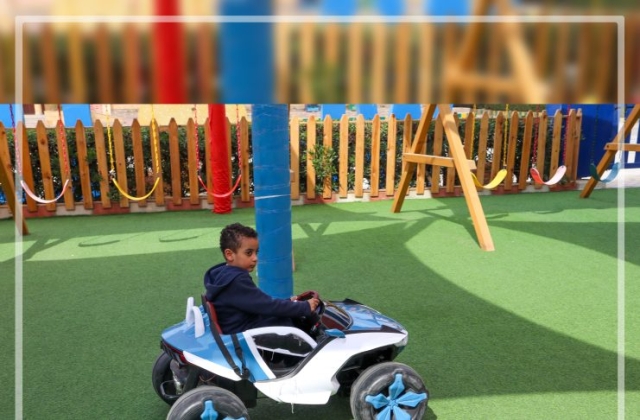 I.S.K | American Division | "Students having fun riding the cars" KG 1B | 2022-2023