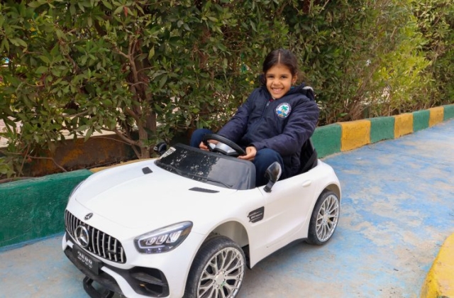 I.S.K | American Division | Students having fun riding the cars KG 2 | 2022-2023