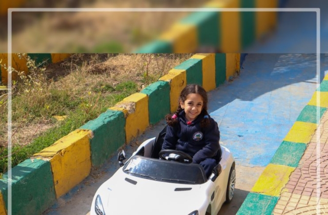 I.S.K | American Division | "Students having fun riding the cars" KG 1B | 2022-2023