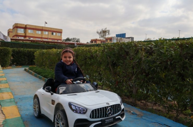 I.S.K | American Division | Students having fun riding the cars KG 2 | 2022-2023