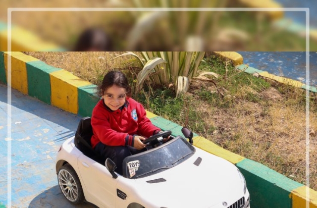 I.S.K | American Division | "Students having fun riding the cars" KG 1B | 2022-2023