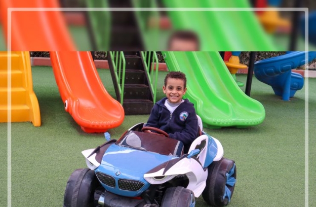 I.S.K | American Division | "Students having fun riding the cars" KG 1B | 2022-2023