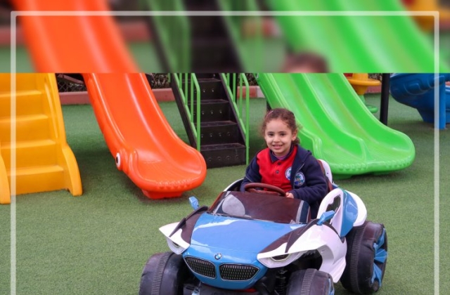 I.S.K | American Division | "Students having fun riding the cars" KG 1B | 2022-2023