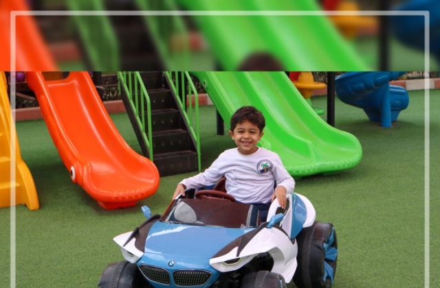 I.S.K | American Division | "Students having fun riding the cars" KG 1B | 2022-2023