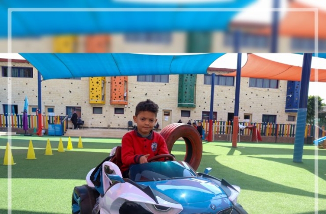 I.S.K | American Division | Students having fun riding the cars KG 2 | 2022-2023