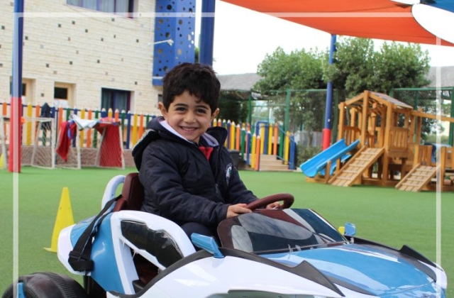 I.S.K | American Division | "Students having fun riding the cars" - KG 1A | 2022-2023