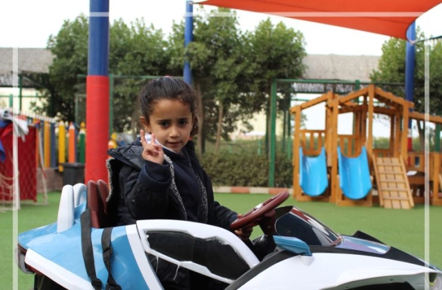 I.S.K | American Division | "Students having fun riding the cars" - KG 1A | 2022-2023